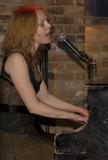 Alicia Witt performing