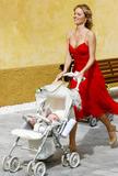 Eva Herzigova is stunning in red at a family affair