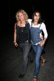 Michelle Rodriguez at club with friend