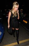 Alex Curran in boots