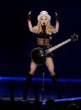 th_81206_Celebutopia-Madonna_performs_during_her_Sticky_and_Sweet_in_Mexico_City-14_122_899lo.jpg