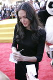 http://img175.imagevenue.com/loc1076/th_22298_Angelina-Jolie_110908-021_122_1076lo.jpg