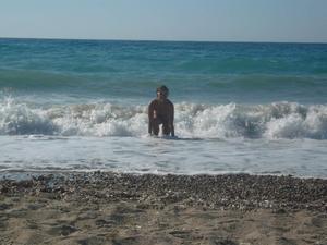 Unknown girl playing topless in Korfu beach Greece-u4evc0tqab.jpg